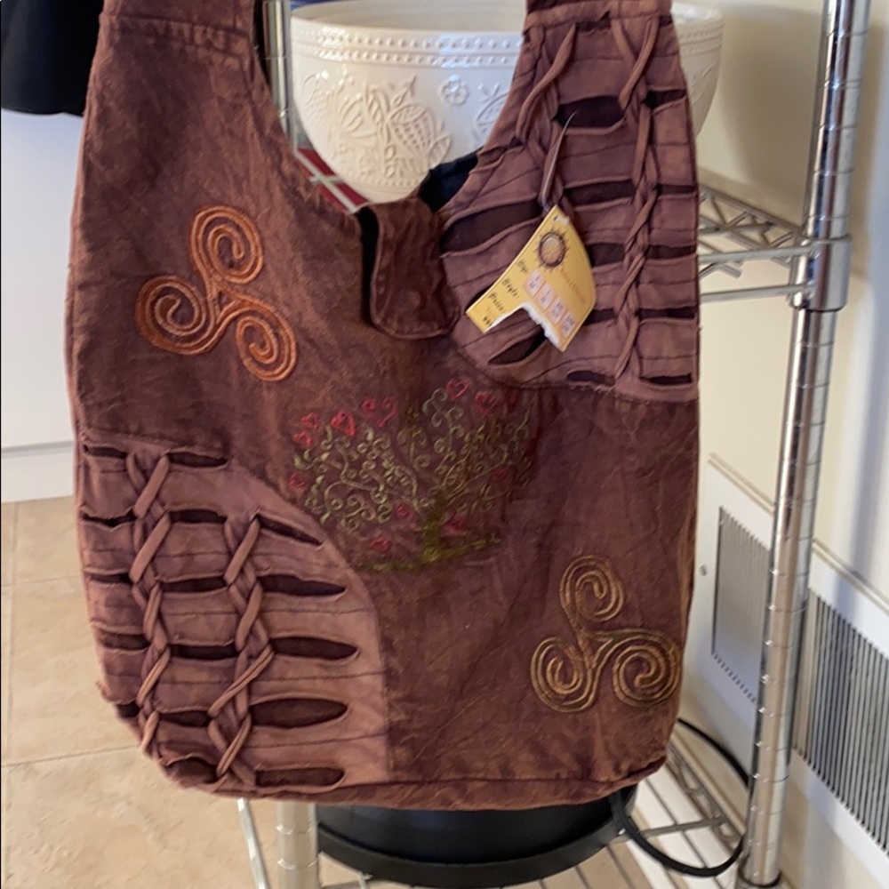 NWT Karma Circle cross body bag.